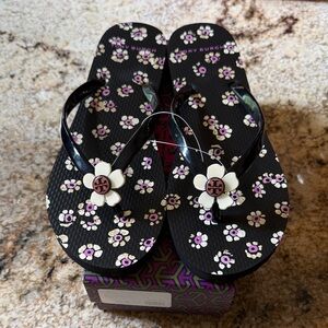Tory Burch Black Floral Flip Flop Sandals with Logo Flower